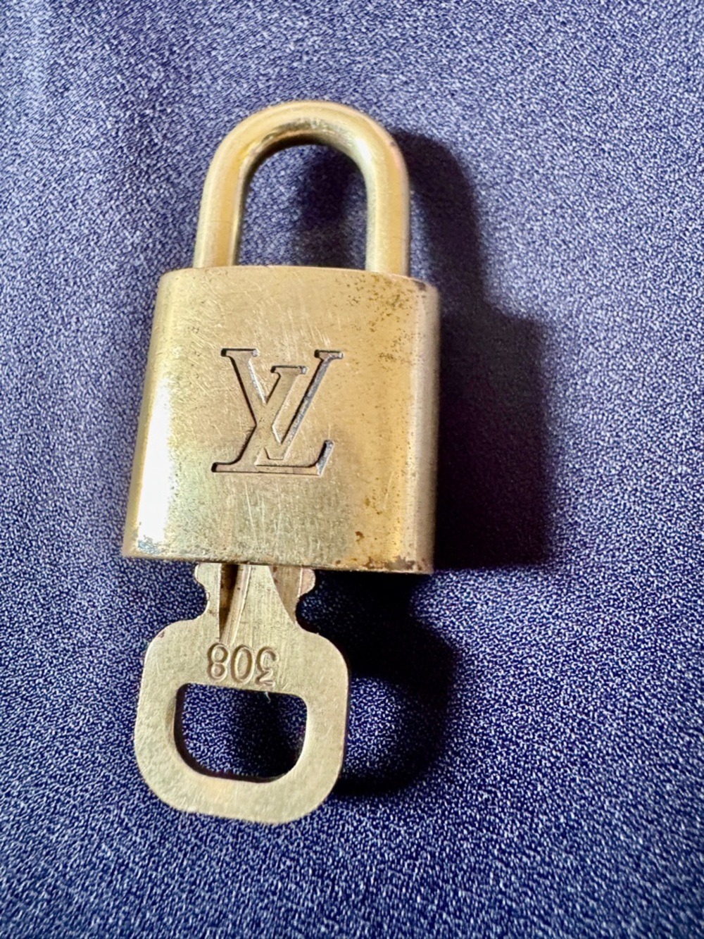 Louis Vuitton Gold Padlock Key Holder